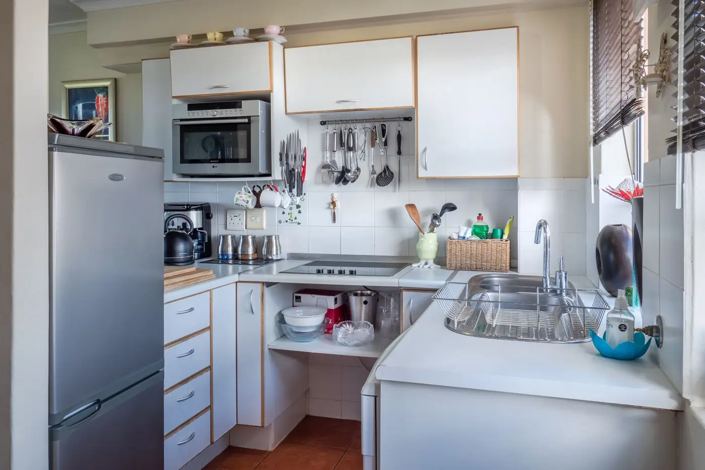 A bright residential kitchen with cabinets and counters. Rockford.