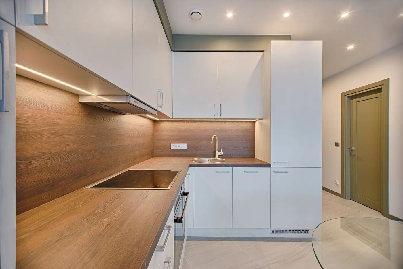 A bright residential kitchen with cabinets and counters. Rockford.