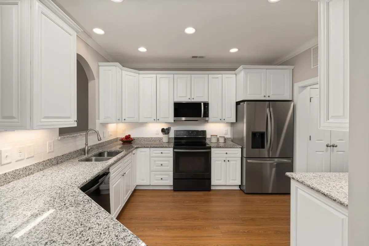 A bright residential kitchen with cabinets and counters. Rockford.